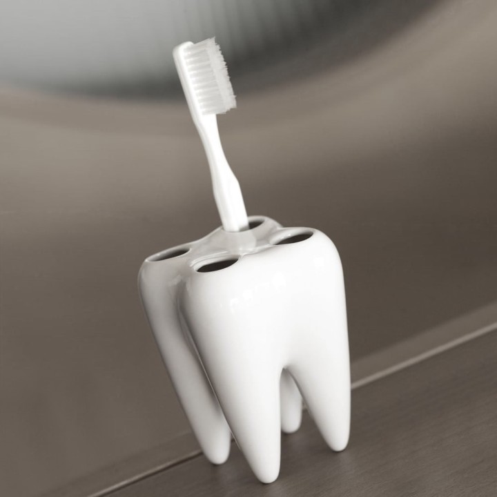 Dente portaspazzolini