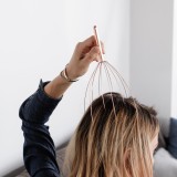 Massaggia testa