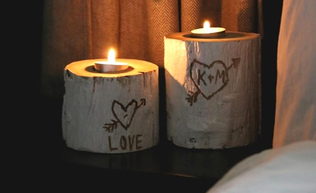 Portalumini con ceppi di legno